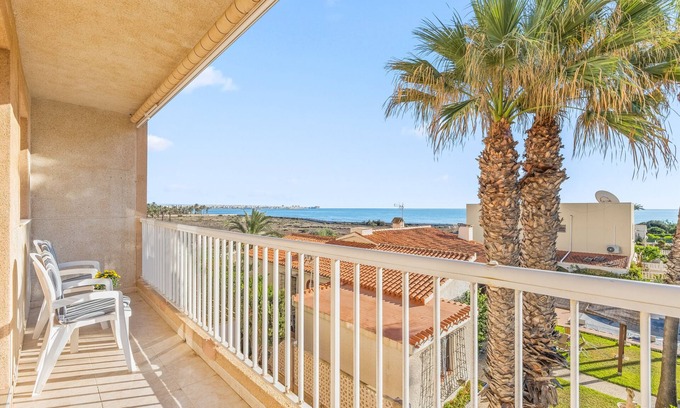 Punta Prima Apartment | Apartment 'Pleamar 23' with Sea View, Wi-Fi and Air Conditioning