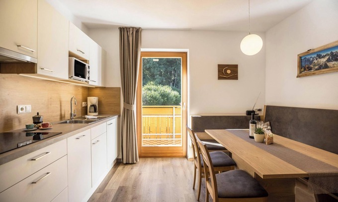 Mantana Apartment | Apartment "Pramstaller Dolomites" with Mountain View, Wi-Fi, Balcony & Garden