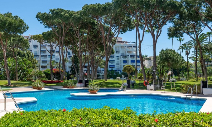 Puerto Banus Apartment | Apartment 'Puerto Banus3 Sandy Beachside' with Shared Pool and Air Conditioning