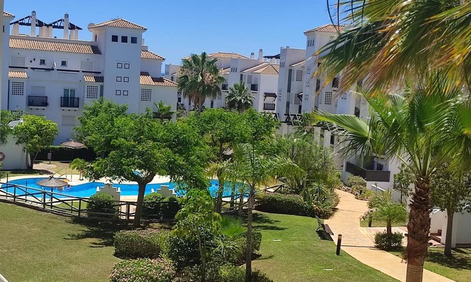 San Luis de Sabinillas Apartment | Apartment 'Residencial Duquesa' with Shared Pool, Wi-Fi and Air Conditioning