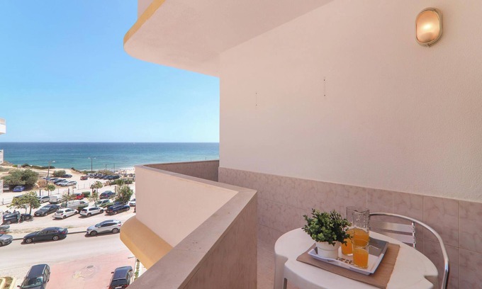 Armacao de Pera Apartment | Apartment Torre Sol 407 - Vista Mar on the Beach with Sea View, Pool, Garden & Balcony