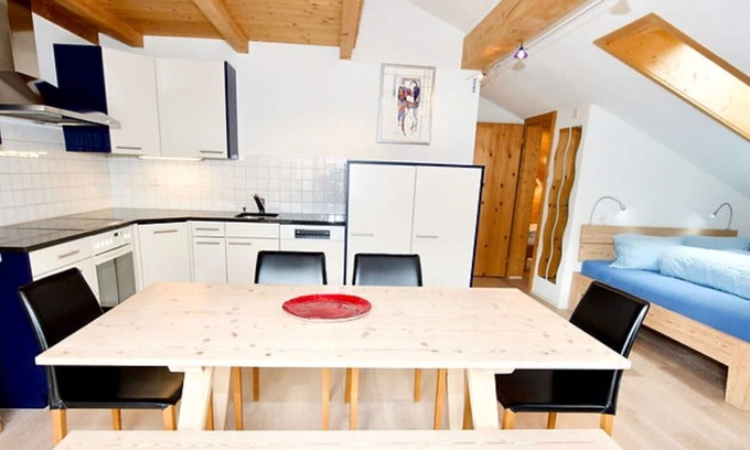 Vals Apartment | Apartment with south-facing balcony, wonderful view of the mountains, close to the ski bus stop