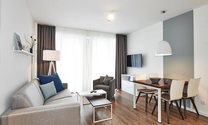 Bensersiel Apartment | Apartment with two balconies incl. use of swimming pool & sauna near the beach -