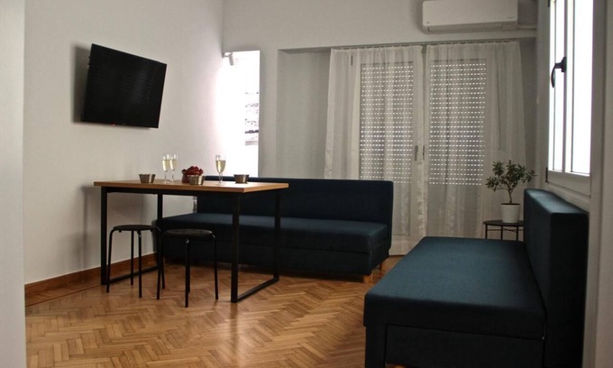 Plaka Apartment | Apollo & Nike 1952-2025nStylish 2-Bedroom apartment next to Syndagma Square