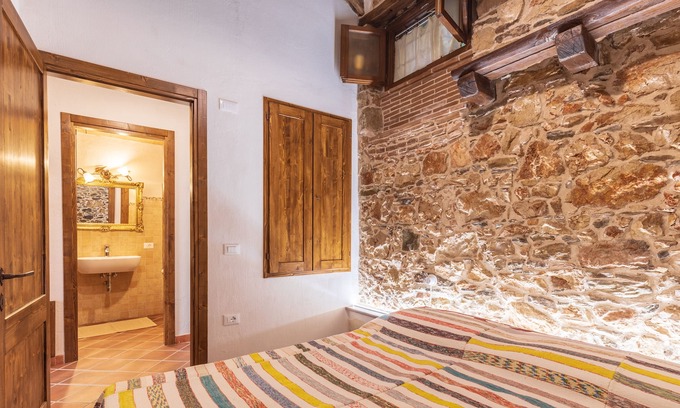 Baunei Apartment | Appartamento in legno e pietra conforme alla tradizione sarda