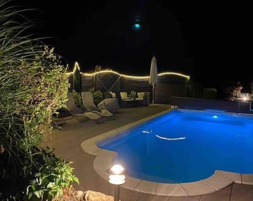 St. Antoni Apartment | Appartement mit Alpensicht, beheiztem Pool, Garten