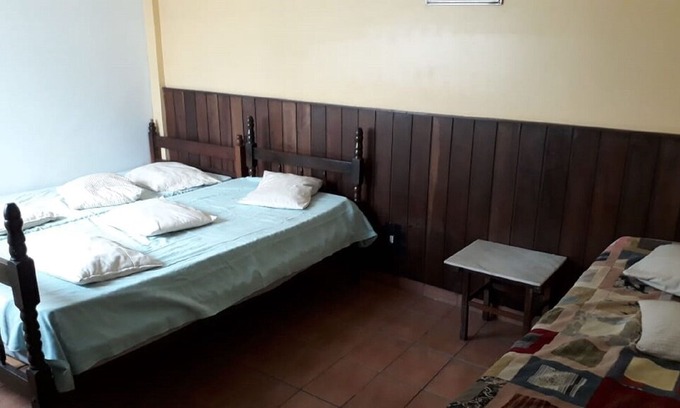 Aparecida Apartment | Apt in building facing the sea