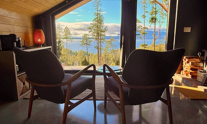 Halfmoon Bay Cabin | Arbutus Ridge, a cozy, architecturally unique cabin surrounded by arbutus trees