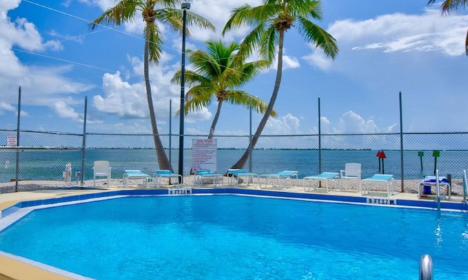 Cutthroat Harbor Estates RV Rental | Areca Palms Cudjoe Key, Florida nRV Concrete Pad only Rental RV’s are PROHIBITED