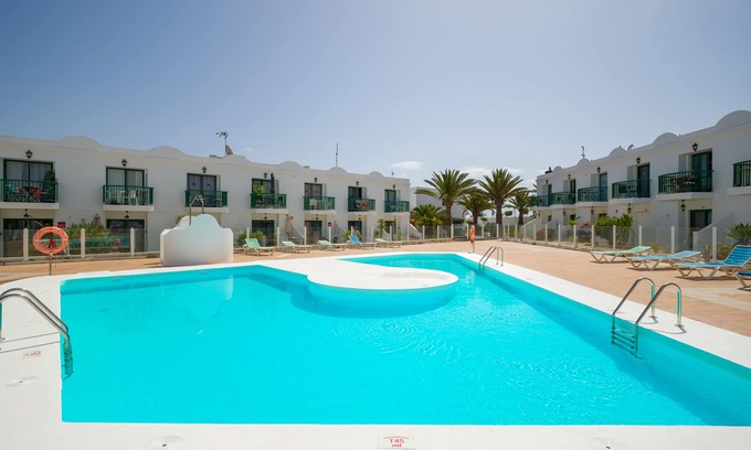 Corralejo Apartment | Armonia Pool View & Wi-Fi by iRent Fuerteventura