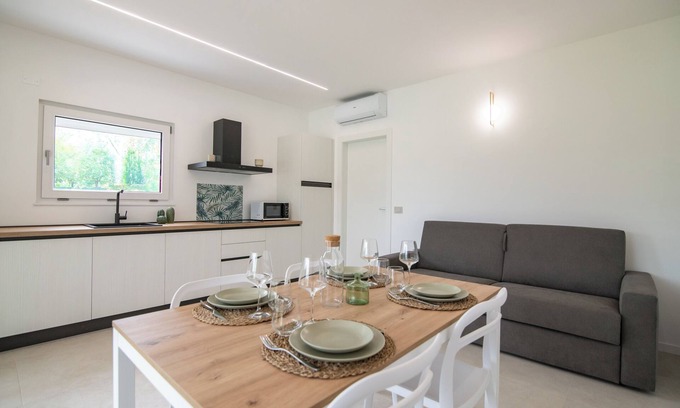 Borgo Milano Apartment | Armonia Suites Terra, new apartment with garden and pool in Verona