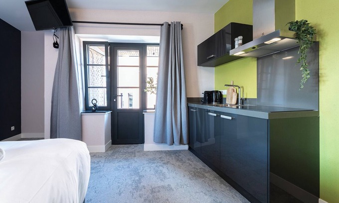 Centrum Apartment | Artist-inspired suite for 2 with king bed, private kitchen, air conditioning, and modern comforts. Perfect for couples, solo travelers, or business stays.