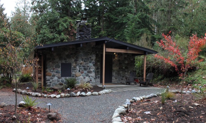 Geneva House | Artists Stone Cabin with Bath House, Sauna & Cedar Soaking Tub in Private Forest