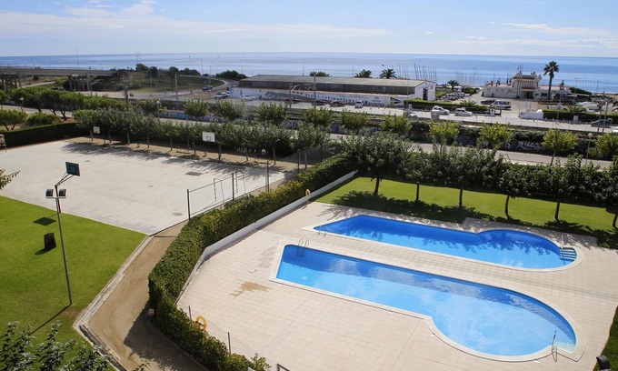 Torredembarra Apartment | AT058 LES DUNES: Apartment 300 m from the beach with communal pool