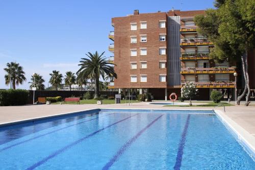 Torredembarra Apartment | AT080 Pins, comunidad con piscina en 1ra línea de la playa
