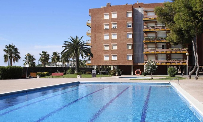 Torredembarra Apartment | AT116 Els Pins, comunidad con piscina en 1ra línea de la playa