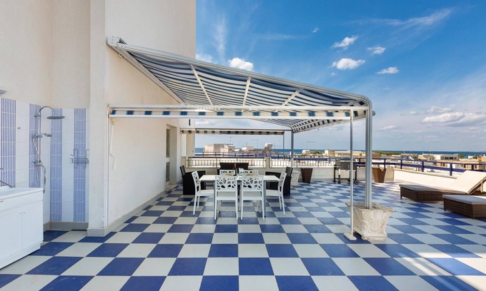 Porto Cesareo House | Attico Primavera by BarbarHouse