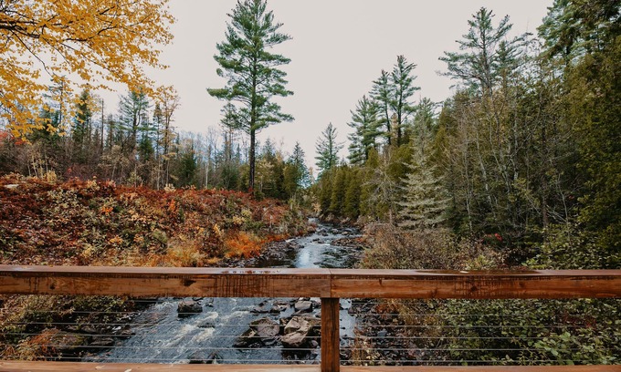 Champion House | ATV-Snowmobile Trail, Large home, sits on the peshekee river. sleeps 18 people.