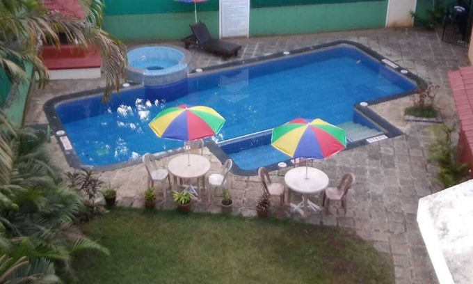 Betalbatim Apartment | Authentic Goa Home Surrounded by Coconut Palm Trees & Pool at Sandray