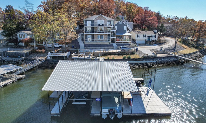 Lake Ozark House | BARE FEET RETREAT! Swim Dock, 5 Decks, Elevator, Gaming Room, Bagnell Dam Strip!