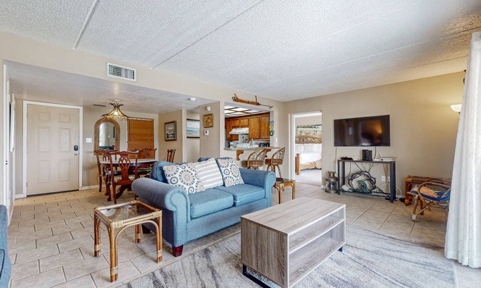 South Padre Island Condo | Bay-view all-suite condo with pool & fishing dock - walk to beach