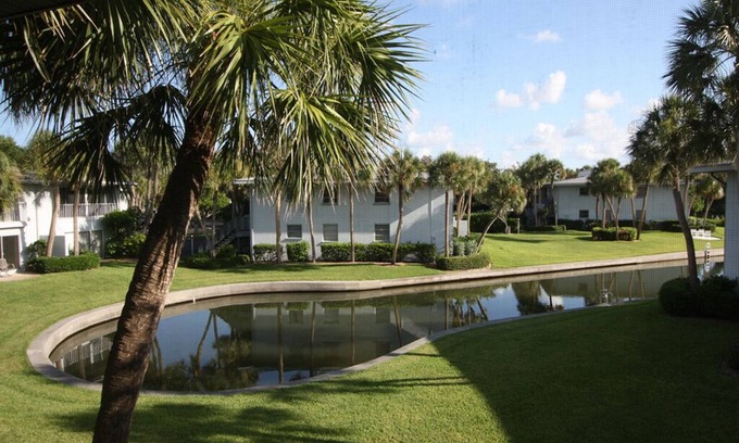 Whitney Beach Condo | Bayside 2BR on Whitney Beach w Canal Views, Pool, and Private Lanai by RVA