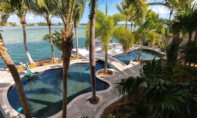 Sugarloaf Shores House | Bayside Beauty: Tropical Paradise 3BR Home, Panoramic Open Water Views, Grotto Pool, Dog-Friendly