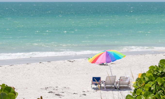 Bradenton Beach Condo | Beach House 3 Beach Front Panoramic Sunset Views Screened Lanai