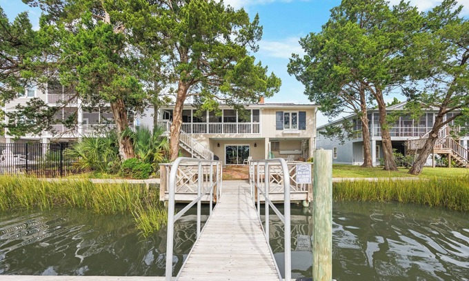 Litchfield by the Sea House | Beach House on Tidal Creek, Dock, Screen Porch, Easy Walk to Beach, Dog Friendly