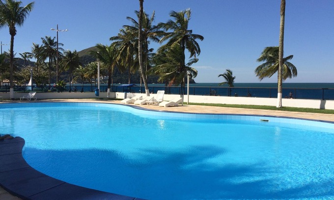 Prainha Apartment | Beachfront Apartment in Martim de Sá Beach, Caraguatatuba, for up to 8 people.