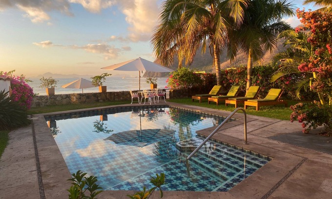 Manzanillo House | Beachfront Jewel directly on the beach in gated community at Club Santiago