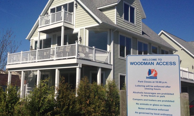 South Haven House | Beachfront Luxury Home-Lake Views, Fire Pit, Large Yard, Game Room-Walk to Town