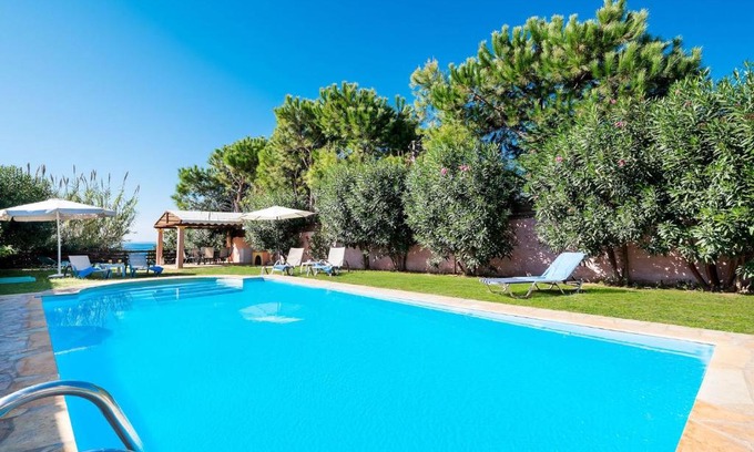 Agios Matthaios Villa | Beachfront Villa Rania by PosarelliVillas