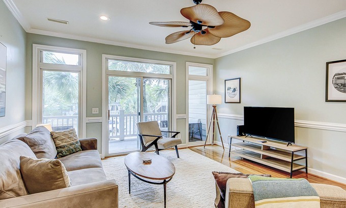Folly Beach Villa | Beachy, three-story villa w/deck & shared pool - walk downtown & to the beach