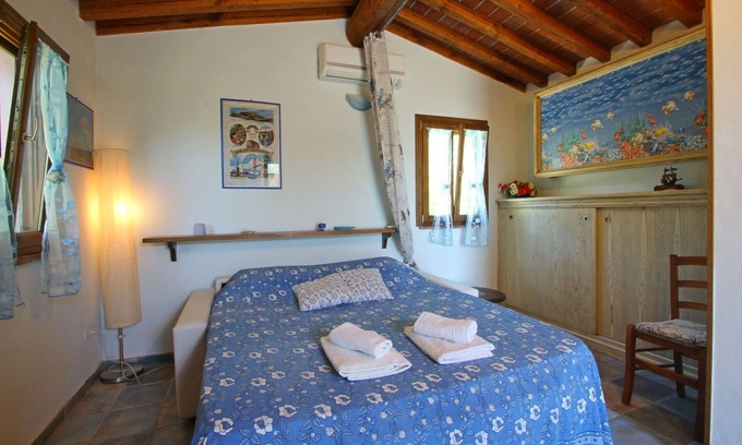 Castiglione della Pescaia House | Beautiful private villa for 3 guests with A/C, hot tub, TV, veranda, pets allowed and panoramic .