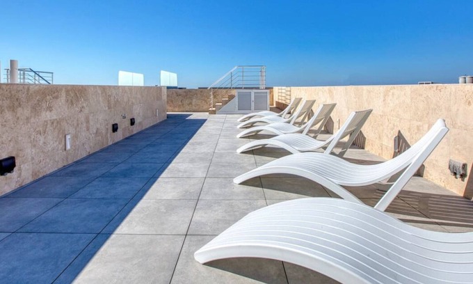 Mellieha Apartment | Beautiful 3BR Apt with Balcony & Roof Pool Access
