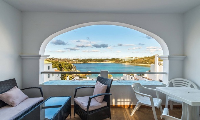 Arenal d'en Castell Apartment | Beautiful Apartment with Wi-Fi, Pool, Terrace and Sea View
