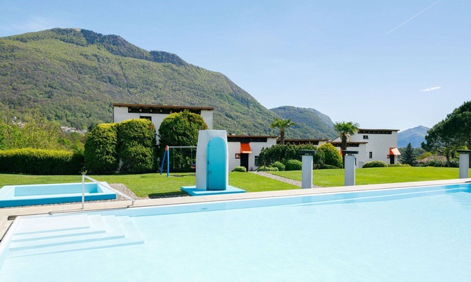 Capriasca Apartment | Beautiful apartment for 5 people with WIFI, pool, TV, patio, pets allowed and panoramic view