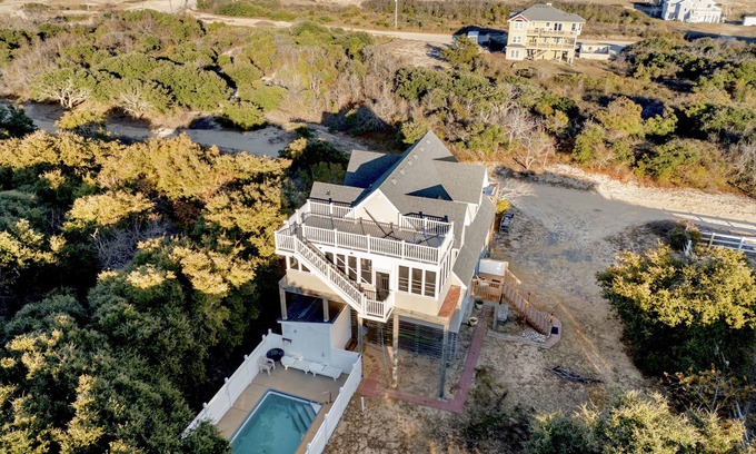 Carova Beach House | Beautiful beach home where wild horses roam free, pool,hot tub,dog friendly