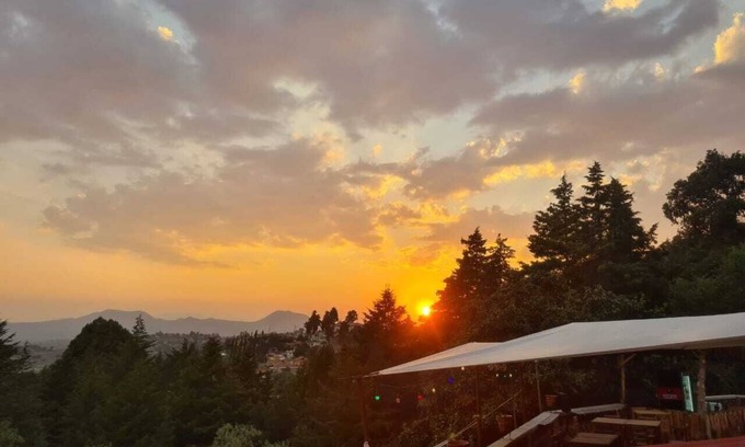 Jiquipilco RV Rental | beautiful glamping with a double bed in the forest