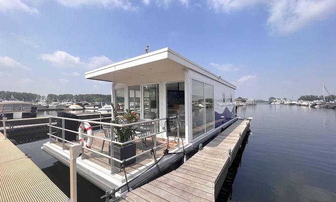 Kerkdriel Boat Rental | Beautiful houseboat in Kerkdriel harbour