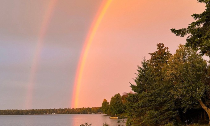 Skanee Cottage | Beautiful Huron Bay sunsets from your own private beach.