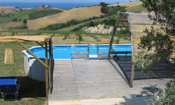 Cologna Spiaggia Villa | Beautiful apartment in villa with WIFI, pool, hot tub, A/C, TV, patio, pets allowed, panoramic view