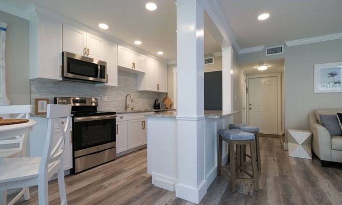 Whitney Beach Condo | BEAUTIFUL Remodeled 2 Bed/1.5 Bath Right on the Water w/Solar Heated Pool,...