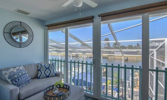 Saint James City Condo | Beautiful SJC Island Condo w/heated pool on main canal, great fishing!