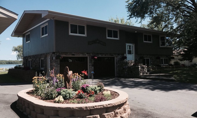 Grand Rapids House | .Beautiful, spacious lake home with level elevation to sandy beach.