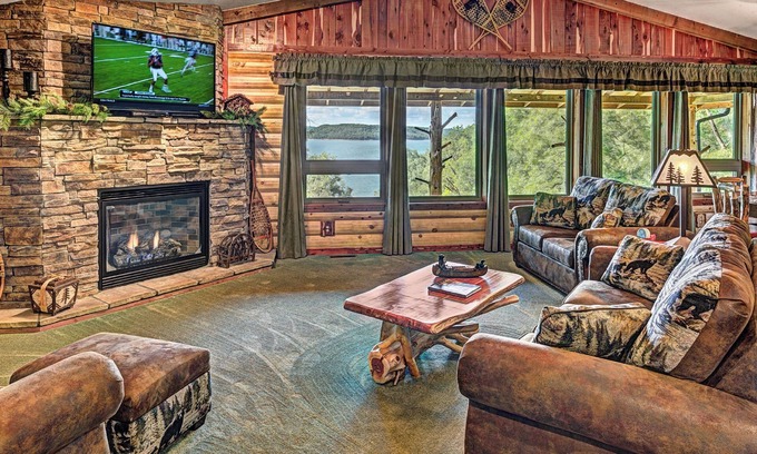 Sylvan Shores Cabin | Beaver Lake Waterfront Homestead House with Hot Tub ON Beaver Lake w/Dock/Slips. Rate based on 4 people.