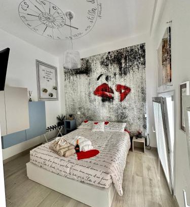 San Benedetto del Tronto Apartment | Bed Art Relaxing Suite - Appartamento con Sauna Love Suite Gallery