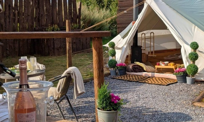 Washford Cabin | Bell tent in ultimate luxury with a wood fired hot tub, super king size bed