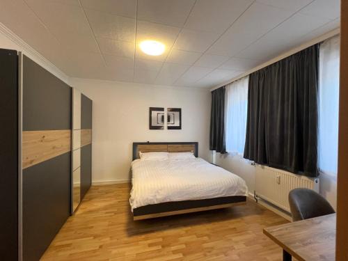 Hochheide Apartment | Bequemes Zimmer in moderner Unterkunft My Pension Duisburg